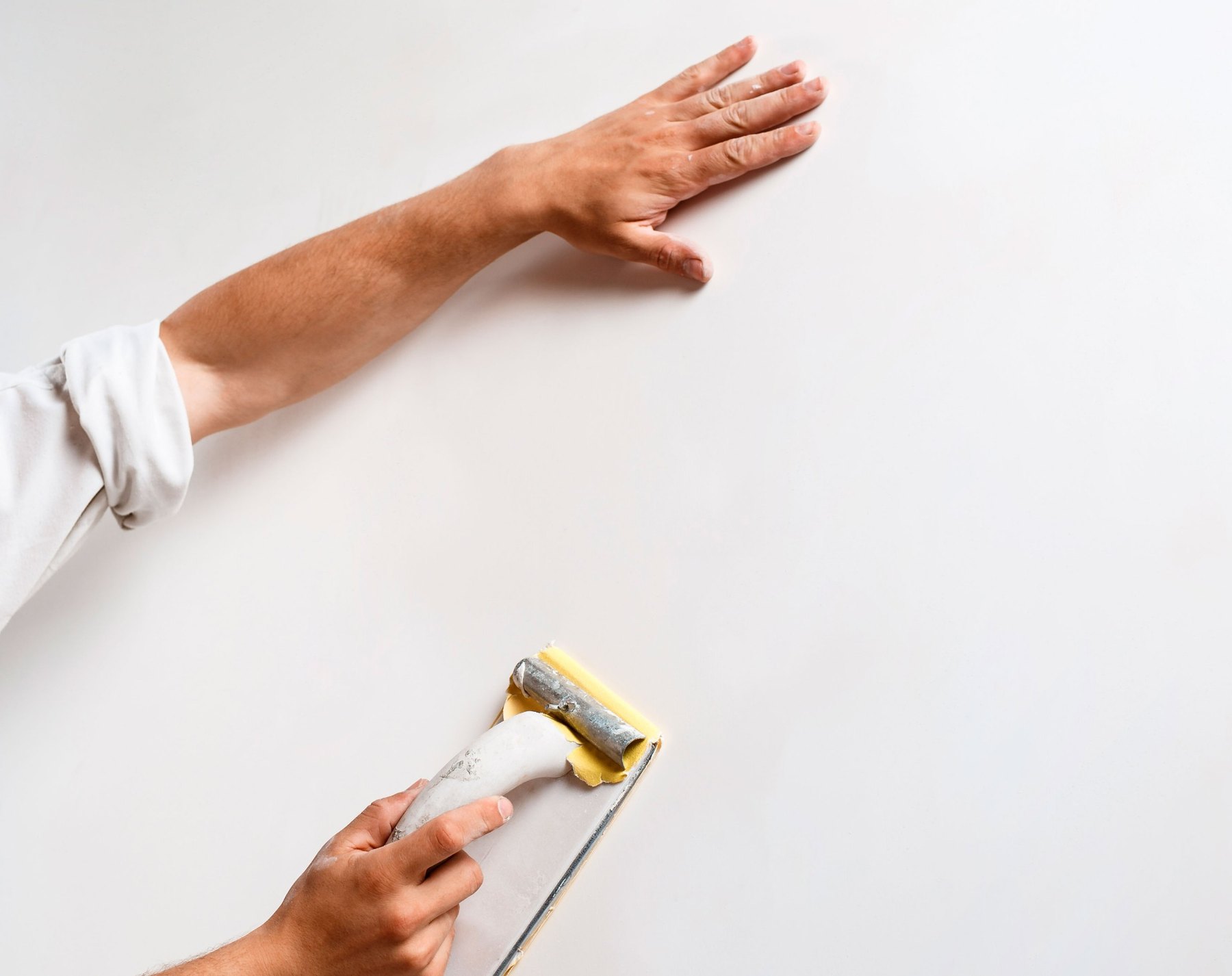 Rasatura parete e lavorazione di finitura superficiale